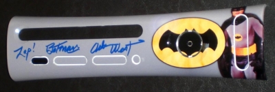 This is a custom printed faceplate featuring Adam West, who starred in the late 60's TV show. It is autographed by Mr. West.