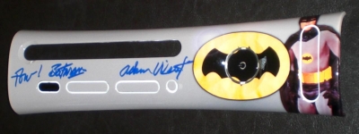 This is a custom printed faceplate featuring Adam West, who starred in the late 60's TV show. It is autographed by Mr. West.