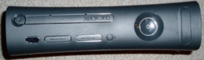 There appears to be two versions of the plate that comes with the debug kits: one with one USB door and one with two. The kits and plates are a dark gray, not as dark as an Elite.